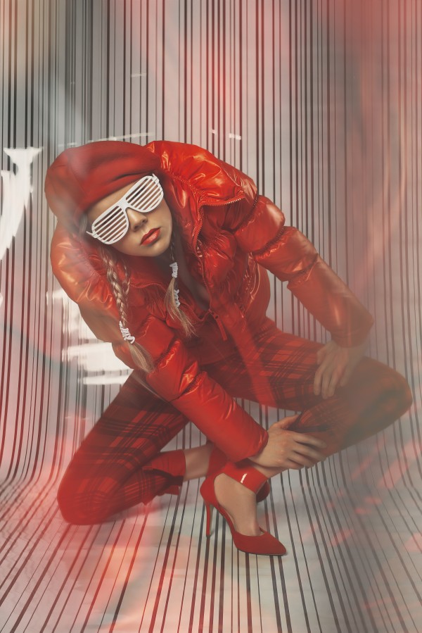 Beautiful blonde fashion model wearing braids in a red outfit with grill glasses posing in a white striped plastic environment by Artmood Visualz